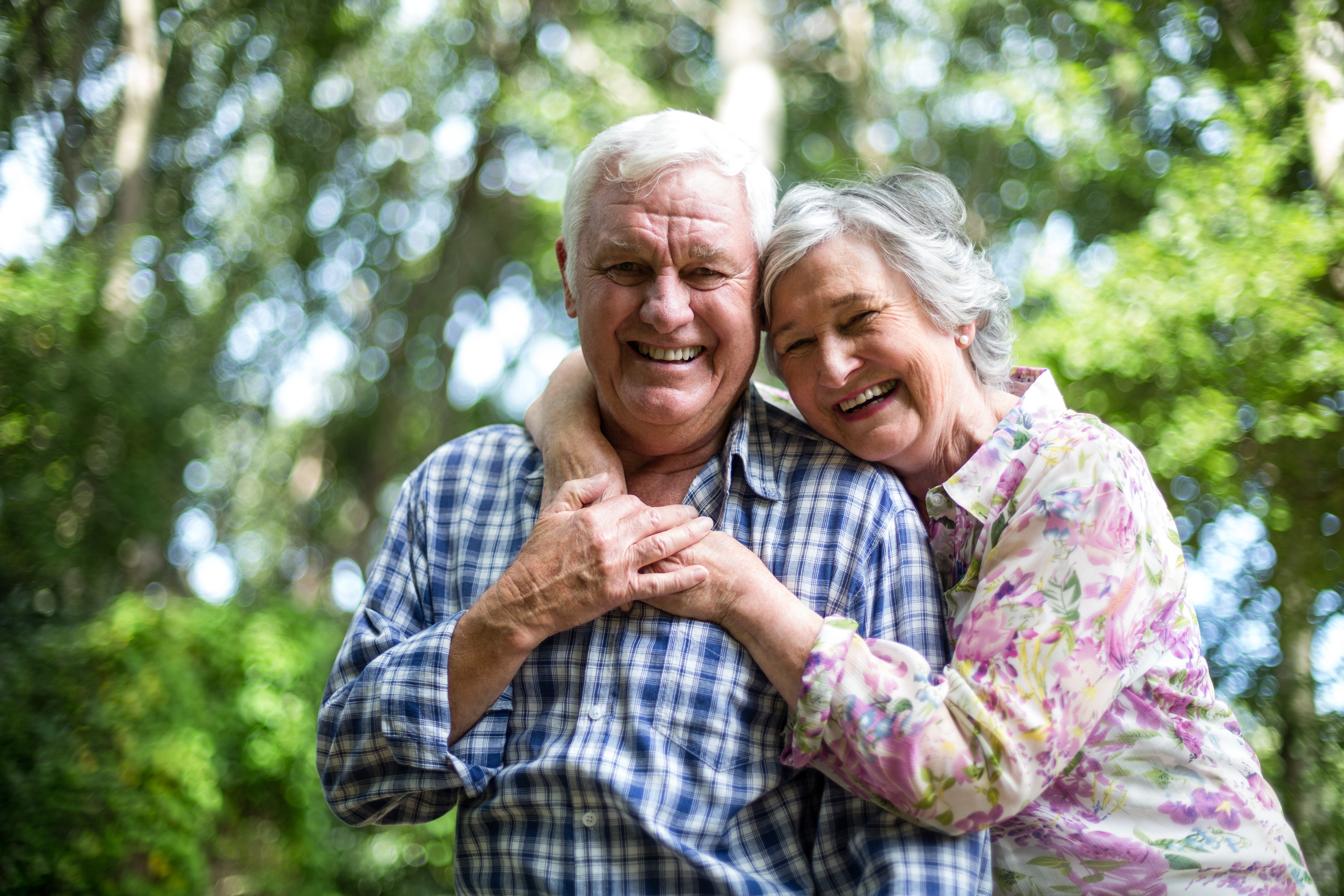 senior husband and wife outdoors